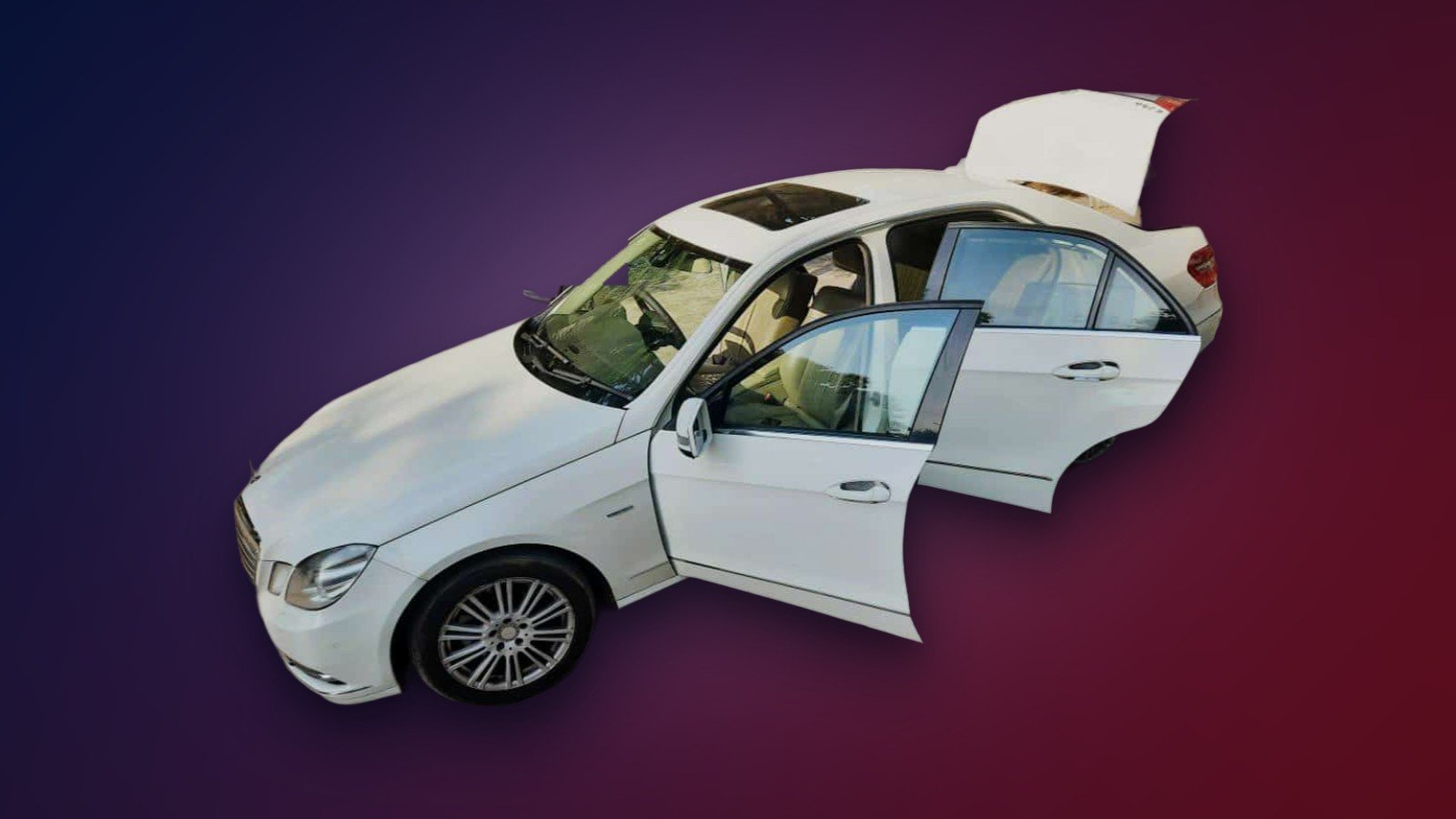 A white Mercedes-Benz C-Class from the VA Experiences fleet
